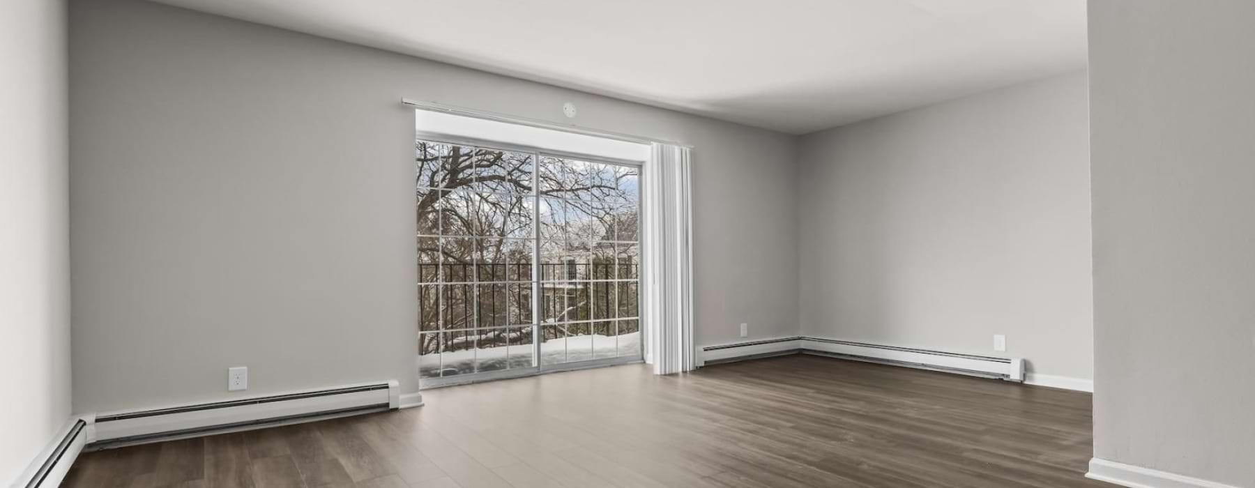 a living room with wood floors
