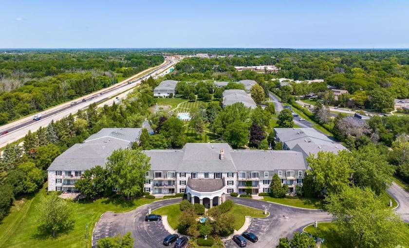 a large building with a parking lot