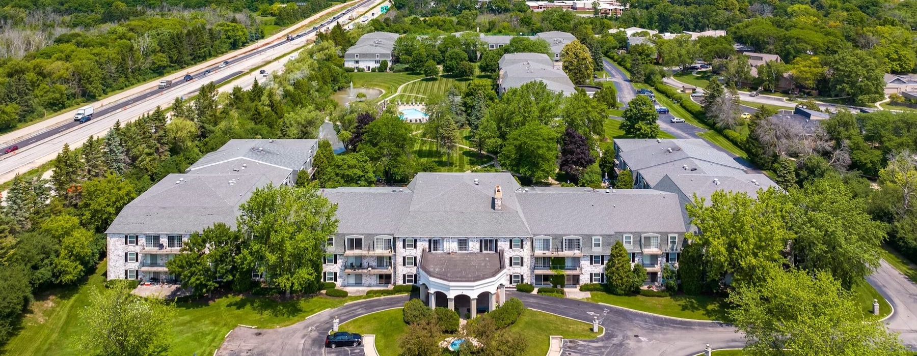 a large building with a parking lot